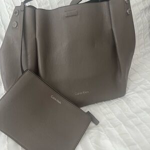 Like new!  Calvin Klein reversible tote bag with detachable purse.